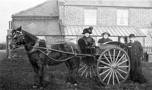 Francis Leach and family outside the Mill House, 22 Old Lynn Road, Wisbech